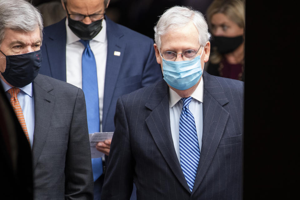 UNITED STATES - NOVEMBER 10: Senate Majority Leader Mitch McConnell, R-Ky., right, Sens. Roy Blunt, R-Mo., left, and John Thune, R-S.D., arrive for a news conference after the Senate Republican Policy luncheon in Hart Building on Tuesday, November 10, 2020. (Photo By Tom Williams/CQ-Roll Call, Inc via Getty Images)