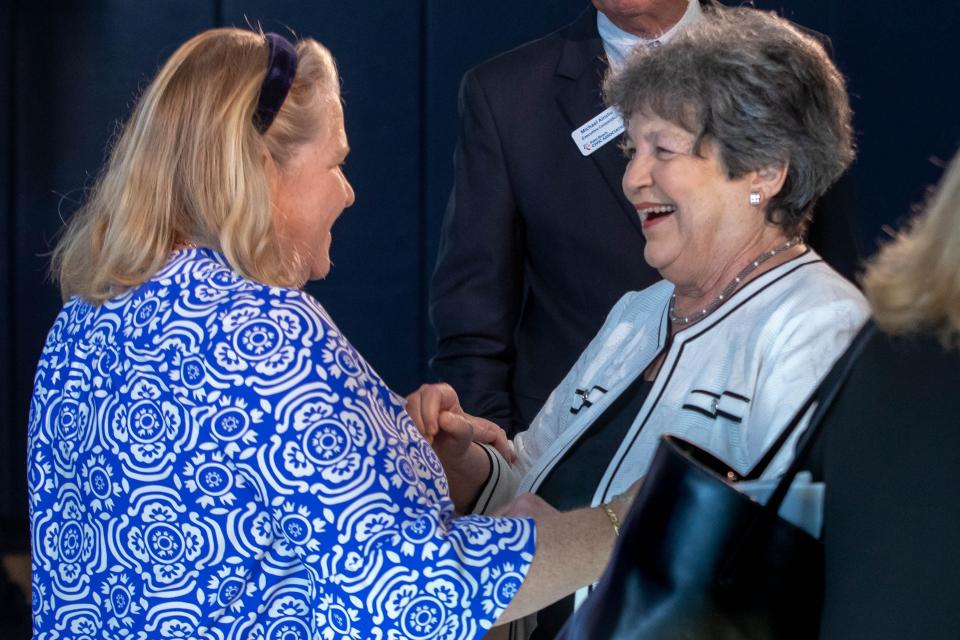 Mayor Danielle Moore, left, chats with Congressman Lois Frankel at the Palm Beach Civic Association's Oct. 18 candidates' forum.