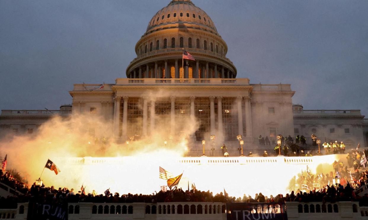 <span>Supporters of Donald Trump riot at the Capitol in Washington, on 6 January 2021.</span><span>Photograph: Leah Millis/Reuters</span>