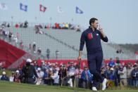 Team USA's Patrick Cantlay hushes the crowd on the 15th hole during a foursome match the Ryder Cup at the Whistling Straits Golf Course Friday, Sept. 24, 2021, in Sheboygan, Wis. (AP Photo/Charlie Neibergall)