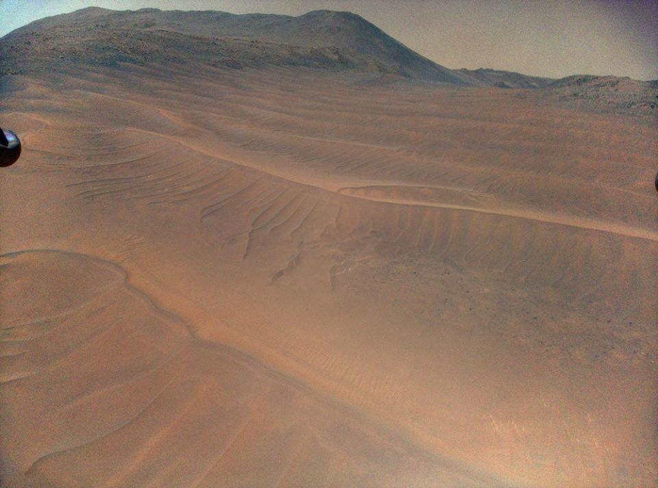 <em>NASA’s Ingenuity Mars Helicopter captured this view of sand ripples during its 70th flight, on Dec. 22, 2023. The smooth, relatively featureless terrain proved difficult for the helicopter’s navigation system to track during Flight 72, on Jan. 18, 2024, resulting in a rough landing. Credits: NASA/JPL-Caltech.</em>