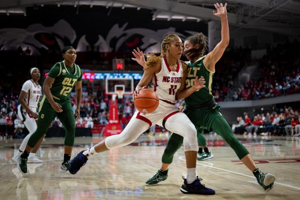 Jakia Brown-Turner drives to the hoop during an NC State women's basketball game against visiting Charlotte on Wednesday, Nov. 16, 2022, at Reynolds Coliseum in Raleigh.