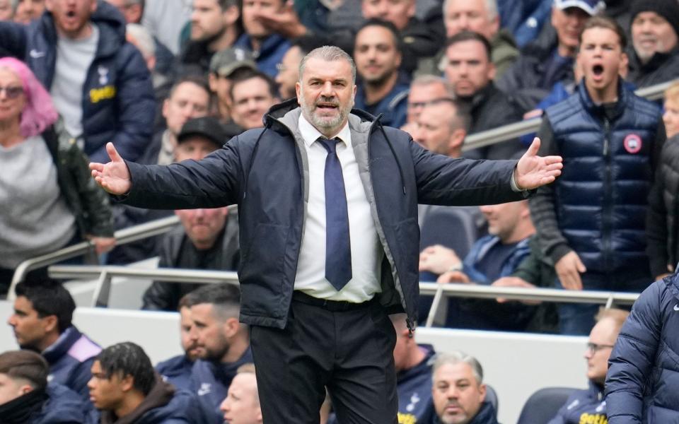 Tottenham's head coach Ange Postecoglou gestures during the English Premier League soccer match between Tottenham Hotspur and Arsenal at the Tottenham Hotspur Stadium in London, England, Sunday, April 28, 2024