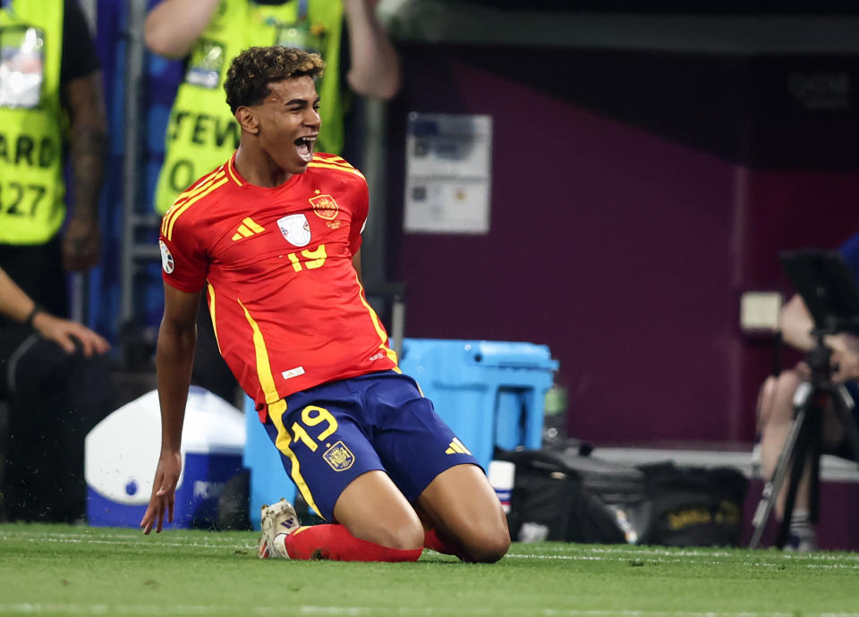 MUNICH, GERMANY - JULY 09: Lamine Yamal of Spain celebrates as he scores the goal 1:1 during the UEFA EURO 2024 semi-final match between Spain v France at Munich Football Arena on July 09, 2024 in Munich, Germany. (Photo by Stefan Matzke - sampics/Getty Images)