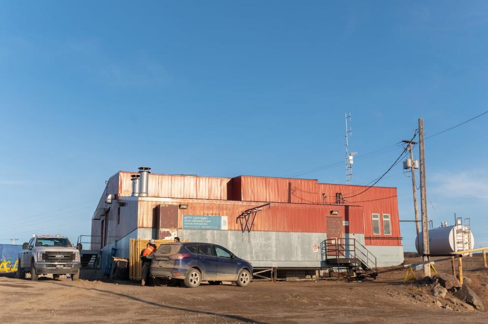 Work on the City of Iqaluit water treatment plant continues in Iqaluit, Nunavut, on Wednesday, Oct. 27, 2021. According to a news release issued earlier in the day, the city has installed an online, real-time water monitoring station within the plant that can provide early warning notifications of hydrocarbons. THE CANADIAN PRESS/Dustin Patar