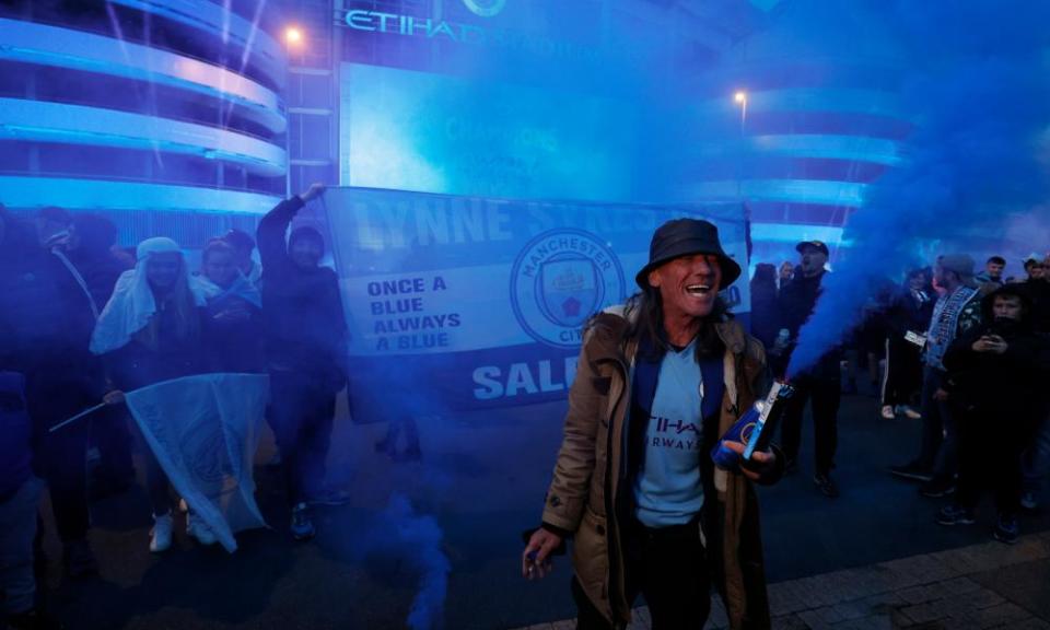 Manchester City fans celebrate their side’s title triumph.