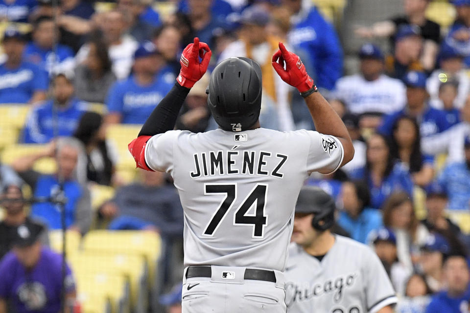 Chicago White Sox's Eloy Jimenez gestures as he scores after hitting a solo home run during the first inning of a baseball game against the Los Angeles Dodgers Thursday, June 15, 2023, in Los Angeles. (AP Photo/Mark J. Terrill)