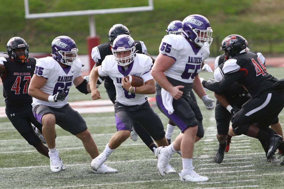 Erie Mason graduate Noah Beaudrie runs the ball for Mount Union. The Purple Raiders will play the North Central Cardinals in the Division III Amos Alonzo Stagg Bowl national championship game tonight.