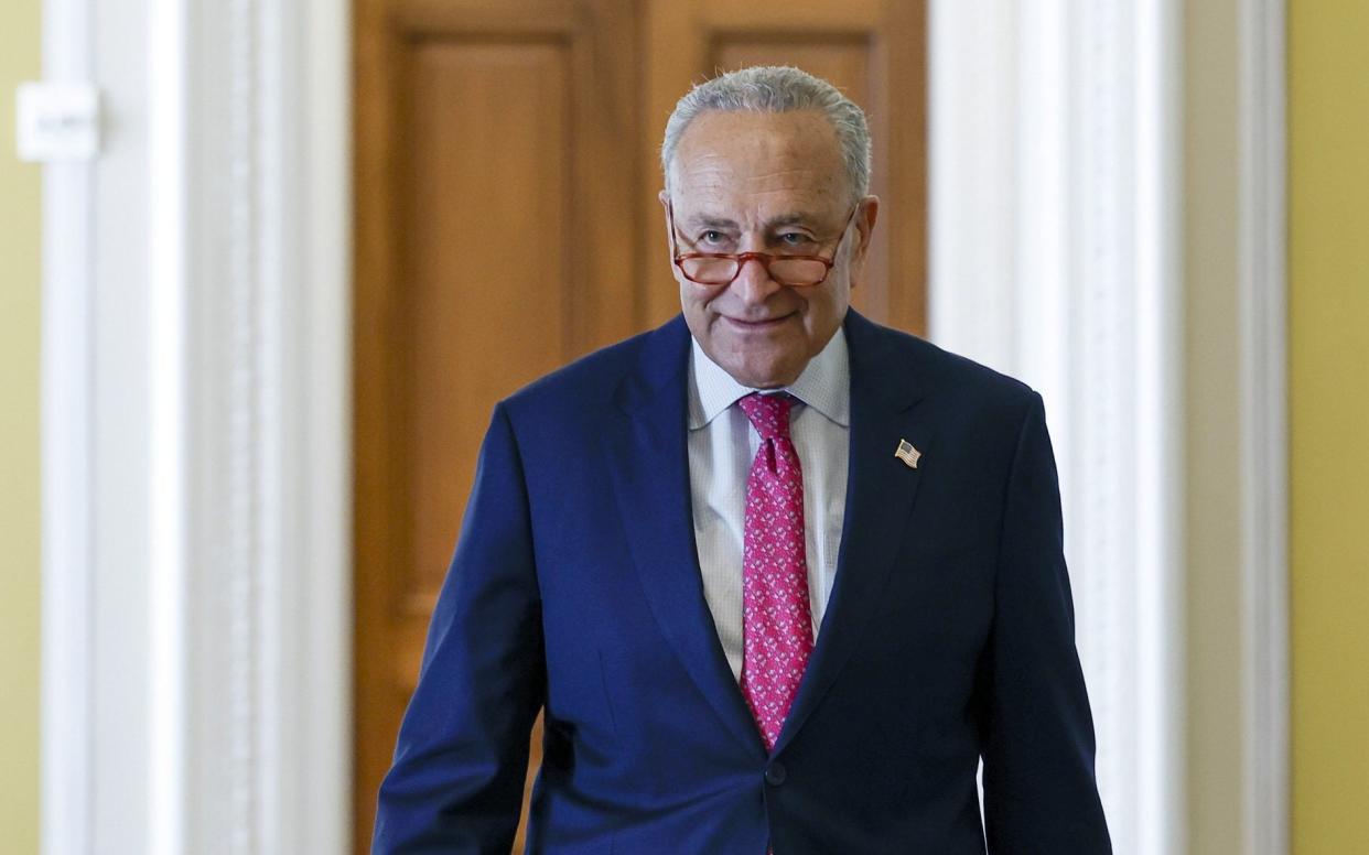 Senate Majority Leader Chuck Schumer walks to the Senate Chambers in the US Capitol Building - Getty Images