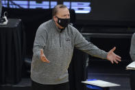 New York Knicks coach Tom Thibodeau reacts during the first half of the team's NBA basketball game against the Golden State Warriors in San Francisco, Thursday, Jan. 21, 2021. (AP Photo/Jeff Chiu)