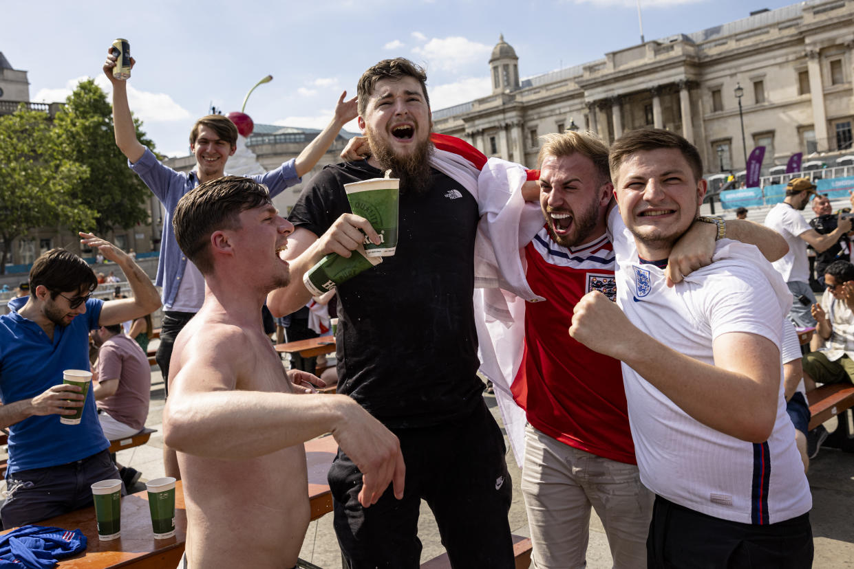 LONDON, ENGLAND - JUNE 13: Football fans at a fan zone in Trafalgar Square celebrate the win as the final whistle goes in England's opening game against Croatia on June 13, 2021 in London, England. Fanzones and pubs are hosting England fans around the country as England take on Croatia at Wembley in the first game of Euro 2020. (Photo by Rob Pinney/Getty Images)