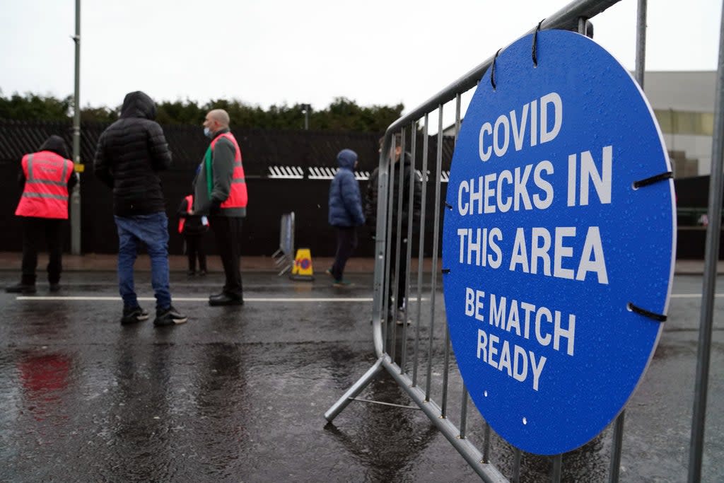 Covid certificates, such as those needed to get into football matches, will no longer be compulsory from Thursday (PA)