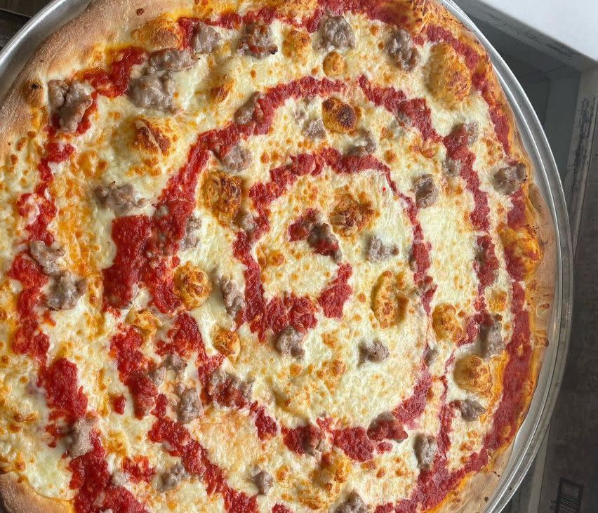 <p><br></p><p>If you head to the Jersey Shore, you’ll discover a style that resembles its cousin to the north, but is indeed a style all its own: Jersey Tomato Pies. These pizzas are big, cheesy, and sold by the slice along the boardwalk, and best identified by its swirl of tomato sauce on top. To transport yourself to the shore, check out <a href="https://www.goldbelly.com/restaurants/marucas-tomato-pies" rel="nofollow noopener" target="_blank" data-ylk="slk:Maruca’s;elm:context_link;itc:0;sec:content-canvas" class="link rapid-noclick-resp">Maruca’s</a>, the tomato pie gold standard since 1950. </p><span class="copyright"> marucaspizzaap/Instagram </span>