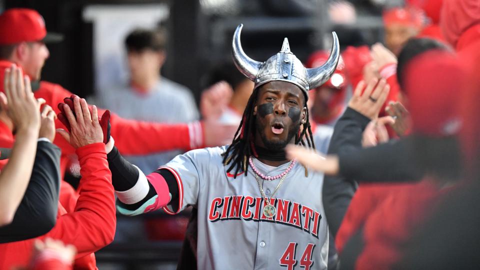 Elly De La Cruz celebrates his 449-foot, three-run home run with teammates in the dugout during the third inning of the Reds' 11-1 victory over the Chicago White Sox  in the series opener Friday night.
