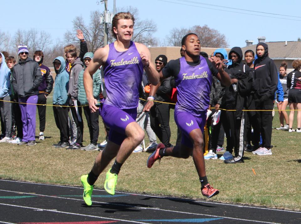 Owen Presley (left) and Lorenzo Wojcik lead Fowlerville's sprint crew.