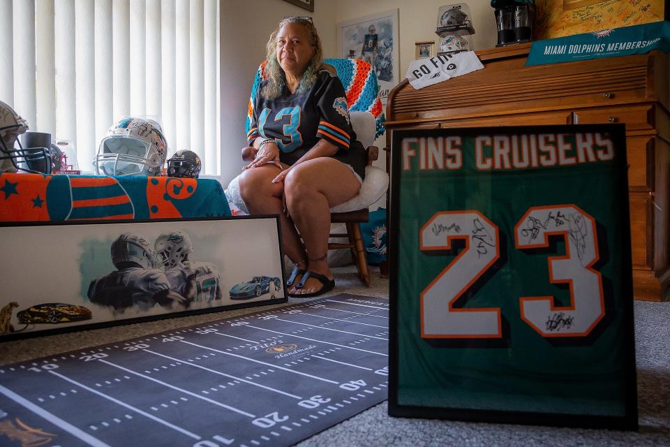 Miami Dolphins fan Maria Caraballo at her home in Loxahatchee on May 10, 2023.
