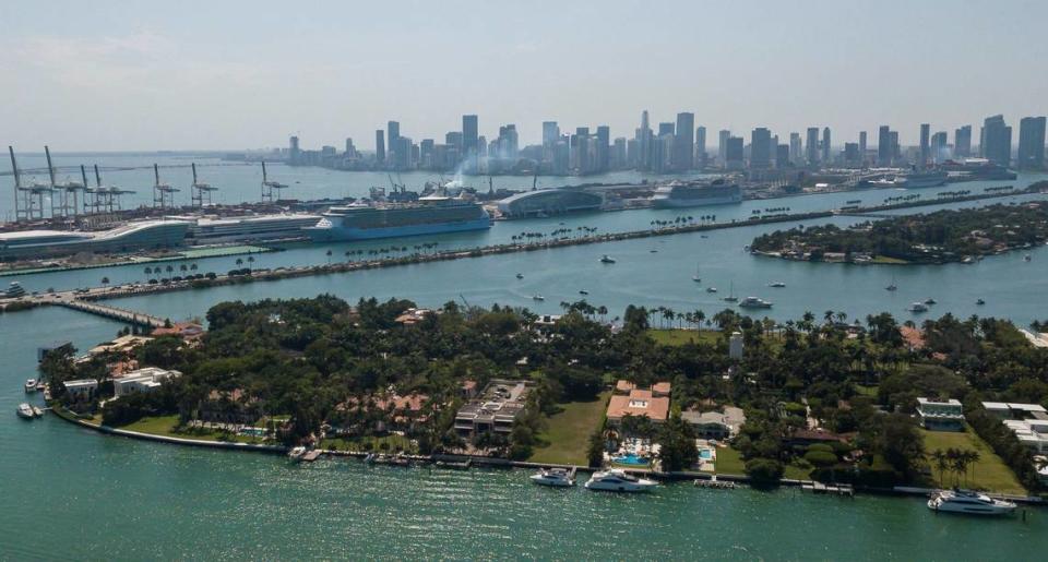 Aerial view shows cruise ships docked at PortMiami on Friday, April 12, 2024, in Miami, Fla.