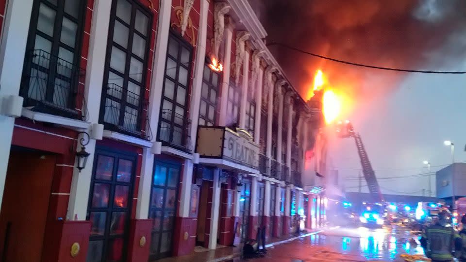 Emergency services work to extinguish the fire on Sunday, where at least 13 people were killed.  - Bomberos/Ayuntamiento de Murcia/AP