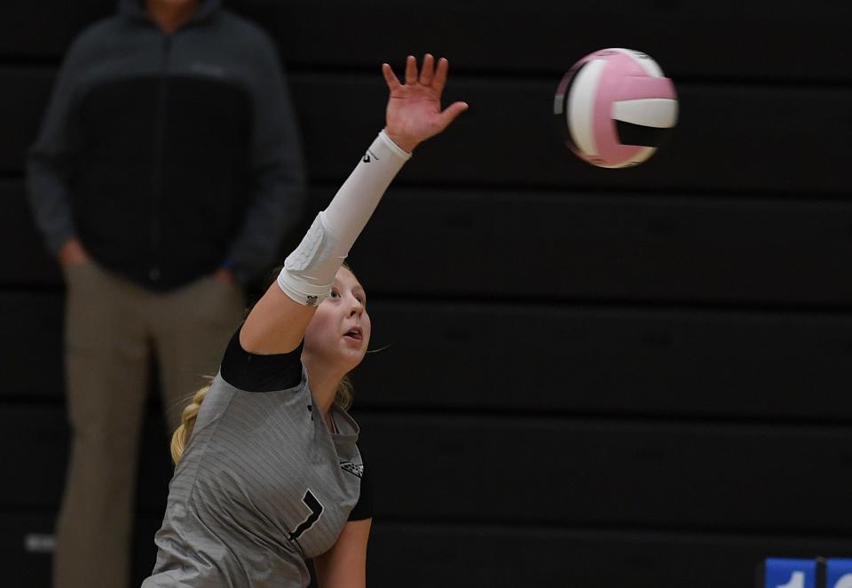 Ankeny Centennial's Delainey Winkel spikes the ball against Pella at the Southeast Polk Invitational on Sept. 10 in Pleasant Hill. The Jaguars are ranked sixth in Class 5A.