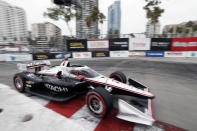 Pole-sitter and second-place finisher Josef Newgarden takes Turn 11 during an IndyCar auto race at the Grand Prix of Long Beach, Sunday, Sept. 26, 2021, in Long Beach, Calif. (AP Photo/Alex Gallardo)