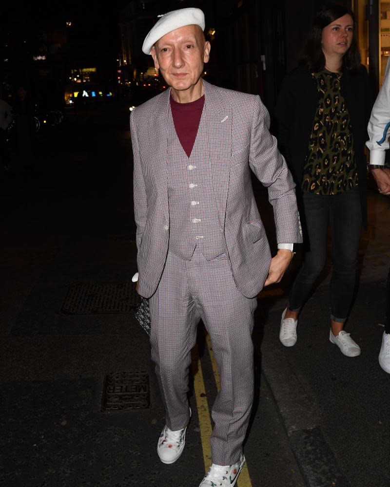 Milliner Stephen Jones wore a white beret to the opening night party.