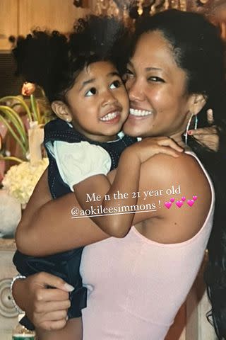 <p>Kimora Lee Simmons/Instagram</p> Kimora Lee Simmons posts throwback photo with daughter Aioki Lee Simmons on her Instagram Story