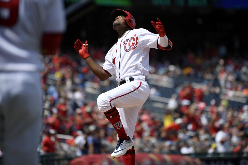 Washington Nationals' Victor Robles celebrates his home run during the first inning of a baseball game against the Milwaukee Brewers, Sunday, Aug. 18, 2019, in Washington. (AP Photo/Nick Wass)