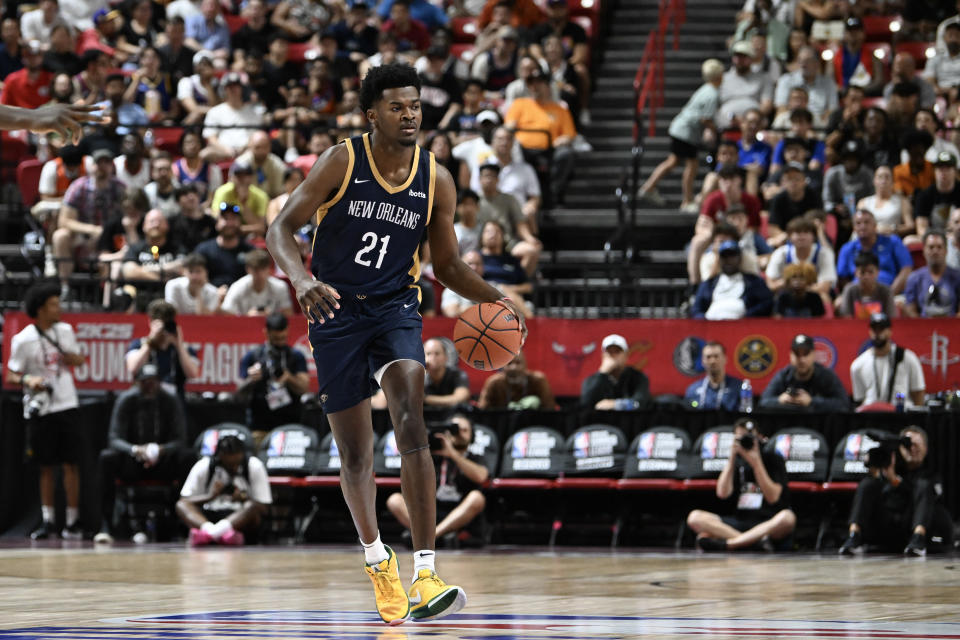 Yves Missi #21 of the New Orleans Pelicans dribbles the ball up the court against the Minnesota Timberwolves in the first half of a 2024 NBA Summer League game at the Thomas & Mack Center on July 12, 2024 in Las Vegas, Nevada. NOTE TO USER: User expressly acknowledges and agrees that, by downloading and or using this photograph, User is consenting to the terms and conditions of the Getty Images License Agreement. (Photo by Candice Ward/Getty Images)