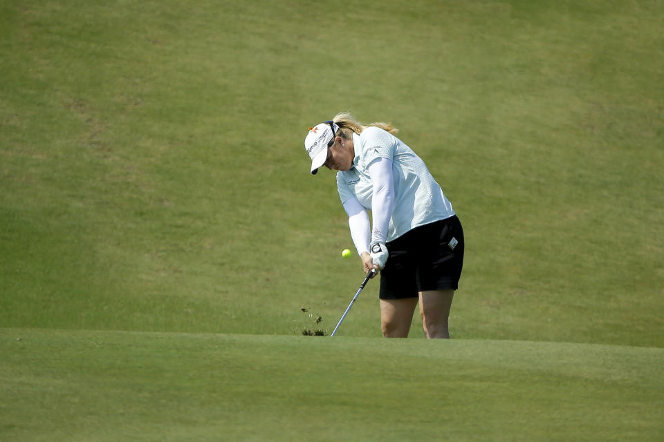 Brittany Lincicome hits from the 18th fairway during the LPGA Tour golf tournament at Kingsmill Resort, Thursday, May 23, 2019, in Williamsburg, Va. (John Sudbrink/The Daily Press via AP)