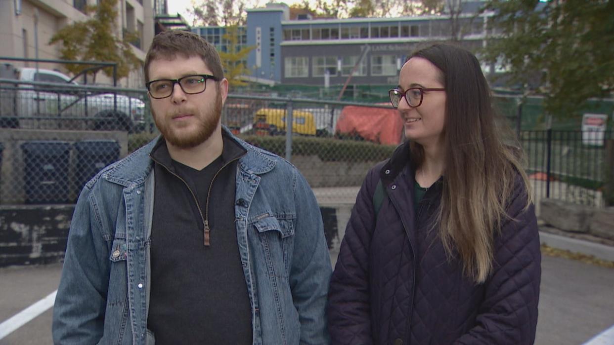 Kyle Gibbons and Hannah Spasov say their Bloor West Village apartment was flooded with sewage twice last spring. They allege that the work to free a trapped boring machine taking place 10 metres away from their home was to blame. The city could not confirm if the work led to the flooding. (Aizick Grimman/CBC - image credit)