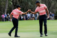 <p>On Dec. 17, the Woodses celebrated a shot with a fist bump. Interestingly both were also battling injuries through the weekend: Tiger, <a href="https://people.com/sports/tiger-woods-withdraws-tournament-foot-injury-difficult-to-walk/" rel="nofollow noopener" target="_blank" data-ylk="slk:plantar fasciitis;elm:context_link;itc:0;sec:content-canvas" class="link ">plantar fasciitis</a> and the continued recovery <a href="https://people.com/sports/tiger-woods-has-long-recovery-ahead-after-car-accident-source/" rel="nofollow noopener" target="_blank" data-ylk="slk:from his 2021 car accident;elm:context_link;itc:0;sec:content-canvas" class="link ">from his 2021 car accident</a>, and Charlie, a rolled ankle. </p>