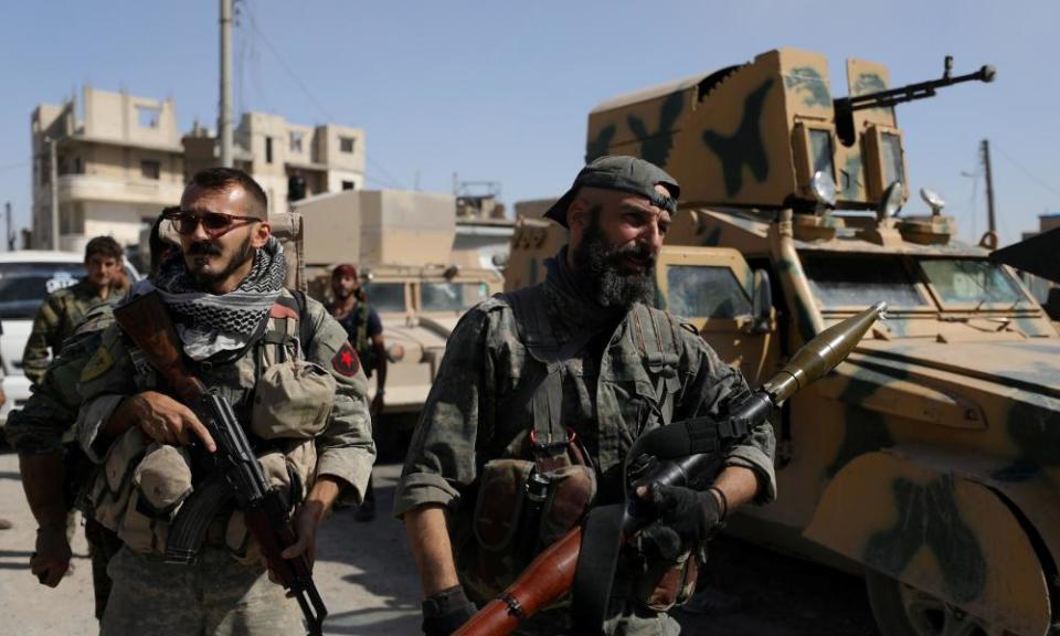 Syrian Democratic Forces fighters in Raqqa, Syria