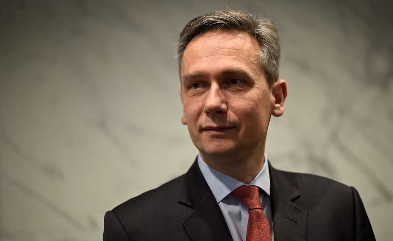 FILE PHOTO: Rio Tinto CEO Jean-Sebastien Jacques poses for photographs before announcing Rio Tinto's 2017 first-half results in London