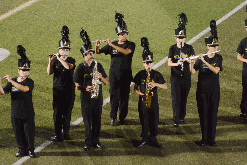 The NFA band performs at halftime in Norwich.