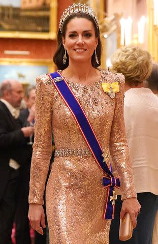 <p>Jonathan Brady / POOL / AFP</p> Kate Middleton attends Buckingham Palace reception on Dec. 6, 2023