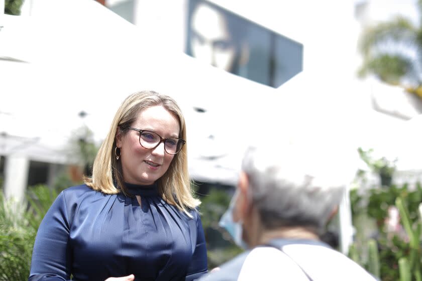 LOS ANGELES, CA - APRIL 10: Lindsey Horvath is running for supervisor in Los Angeles County's District 3. Melrose Place Farmers Market on Sunday, April 10, 2022 in Los Angeles, CA. (Myung J. Chun / Los Angeles Times)