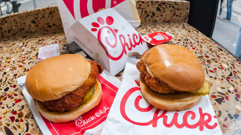 two Chick-fil-A sandwiches on counter