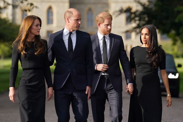 <p>Getty</p> Kate Middleton, Prince William, Prince Harry and Meghan Markle on the long Walk at Windsor Castle on Sept. 10, 2022.