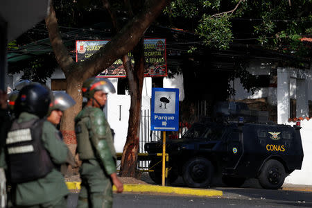 An armored vehicle is seen outside an outpost of the Venezuelan National Guards during a protest in Caracas, Venezuela January 21, 2019. REUTERS/Carlos Garcia Rawlins