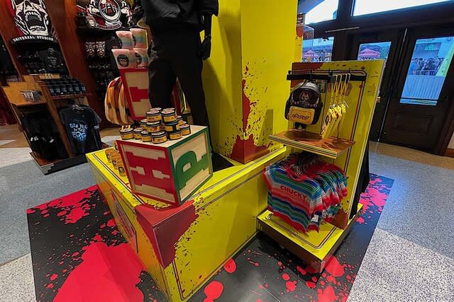 Merch displays at the Chucky activation at Halloween Horror Nights 2023 at Universal Studios Hollywood.