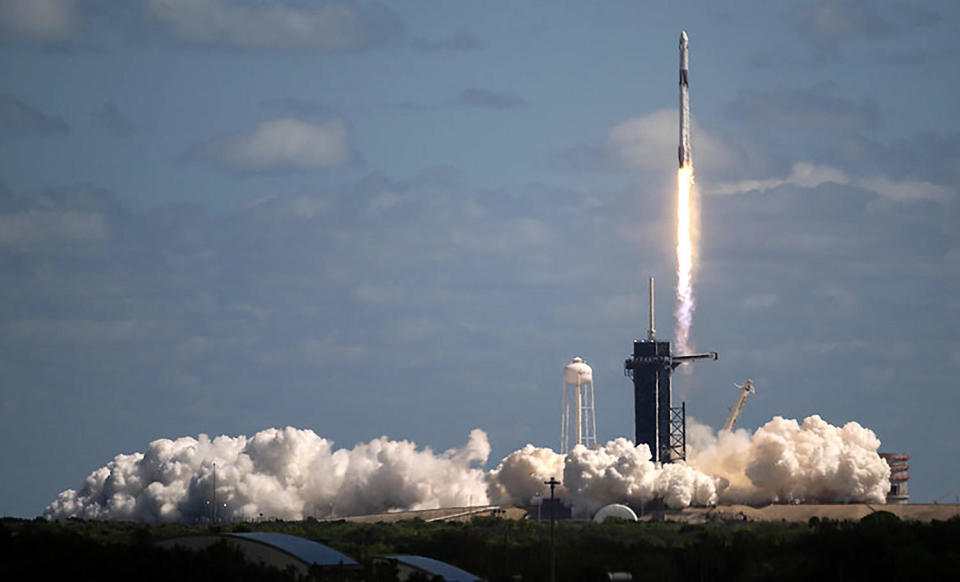 A SpaceX Falcon 9 rocket thunders away from the Kennedy Space Center carrying two NASA astronauts, a Japanese space veteran and a Russian cosmonaut - the first to fly on a U.S. rocket in nearly 20 years - on a 29-hour flight to the International Space Station. / Credit: NASA/Joel Kowsky
