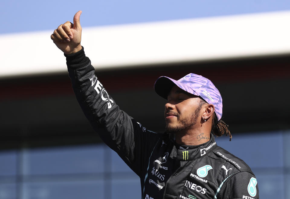 Mercedes driver Lewis Hamilton of Britain gives a thumbs up after the Sprint Qualifying of the British Formula One Grand Prix, at the Silverstone circuit, in Silverstone, England, Saturday, July 17, 2021. The British Formula One Grand Prix will be held on Sunday. (Lars Baron/Pool via AP)