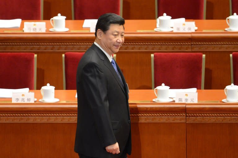 Incoming Chinese president Xi Jinping arrives at the opening session of the National People's Congress in Beijing on March 5, 2013. Inflation is a key issue for the ruling Communist Party as it brings with it the risk of popular discontent over rising prices and the threat of social unrest