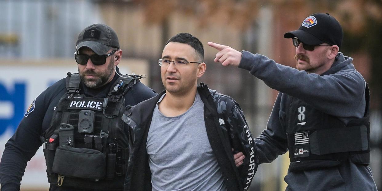 Solomon Pena, a Republican candidate for New Mexico House District 14, is taken into custody by Albuquerque Police officers, on January 16, 2023.