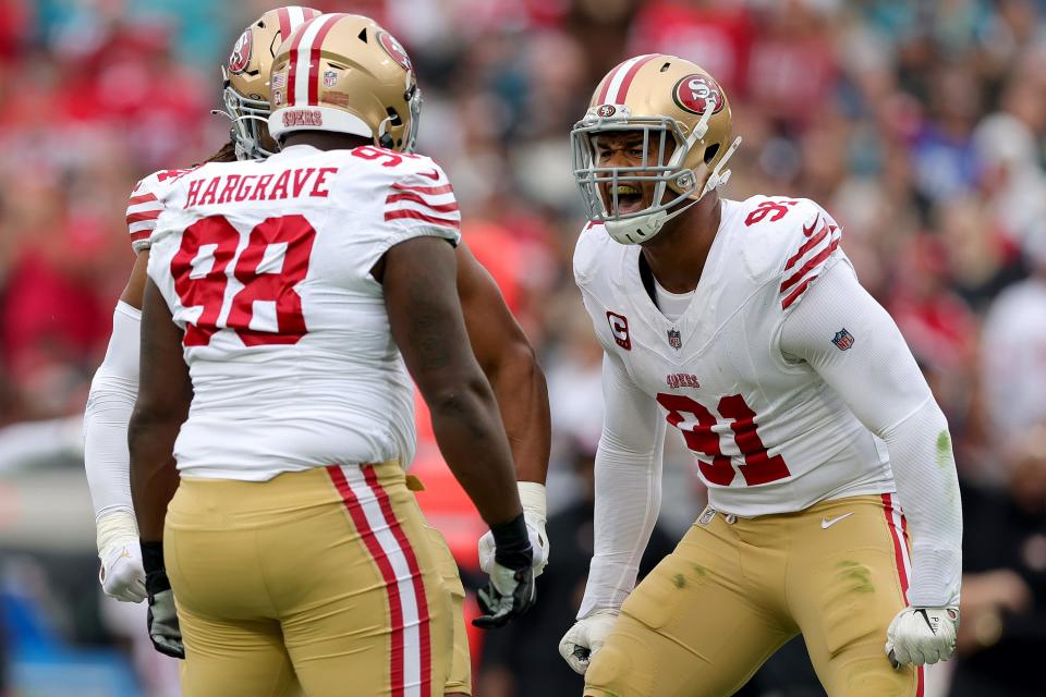 JACKSONVILLE, FLORIDA - NOVEMBER 12: Arik Armstead #91 of the San Francisco 49ers celebrates a sack by Javon Hargrave #98 of the San Francisco 49ers during the first quarter against the Jacksonville Jaguars at EverBank Stadium on November 12, 2023 in Jacksonville, Florida. (Photo by Megan Briggs/Getty Images)