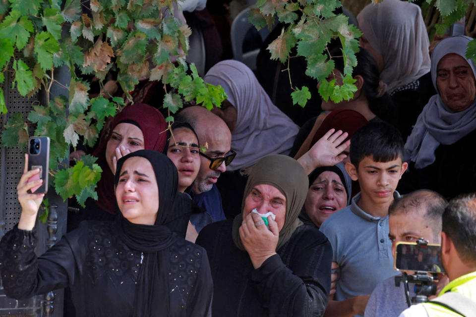 Mourners react during the funeral of 19-year-old Labib Damidi, who the Palestinian health ministry said shot by settlers, in the occupied West Bank town of Huwara on Oct. 6, 2023. (Jaafar Ashtiyeh / AFP - Getty Images)
