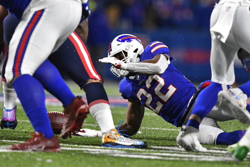 Buffalo Bills running back Matt Breida (22) fumbles against the Patriots. (AP Photo/Adrian Kraus)