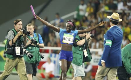 2016 Rio Olympics - Athletics - Final - Women's 4 x 100m Relay Final - Olympic Stadium - Rio de Janeiro, Brazil - 19/08/2016. Tori Bowie (USA) of USA celebrate after the U.S. team won the gold. REUTERS/Lucy Nicholson