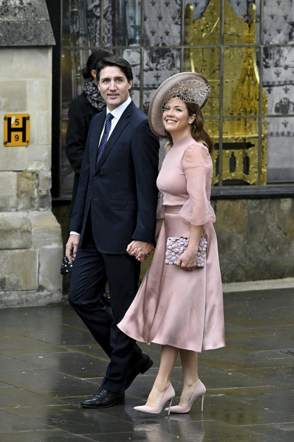 Canadian Prime minister Justin Trudeau and wife Sophie Grégoire Trudeau arrive to attend Britain's King Charles III and Camilla, the Queen Consort, coronation ceremony at Westminster Abbey, London, Saturday, May 6, 2023. (Toby Melville, Pool via AP)