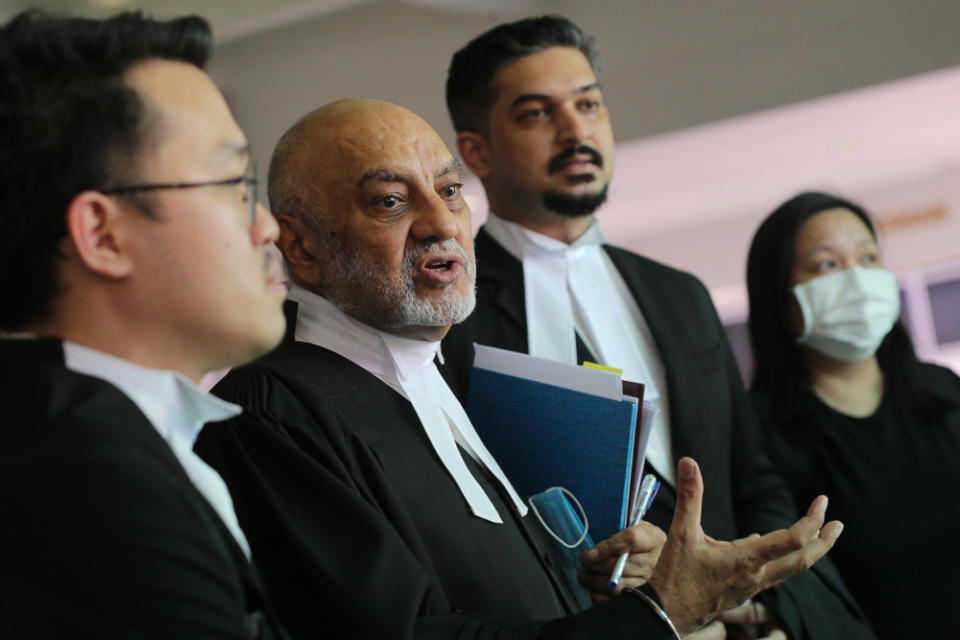 Lawyer Datuk Gurdial Singh Nijar (2nd left) speaks to reporters at the Shah Alam High Court April 23, 2021. — Picture by Yusof Mat Isa